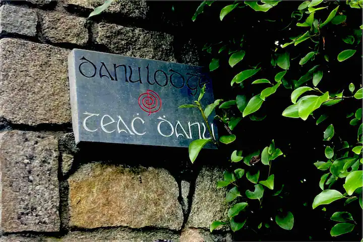 The slate sign at the gate