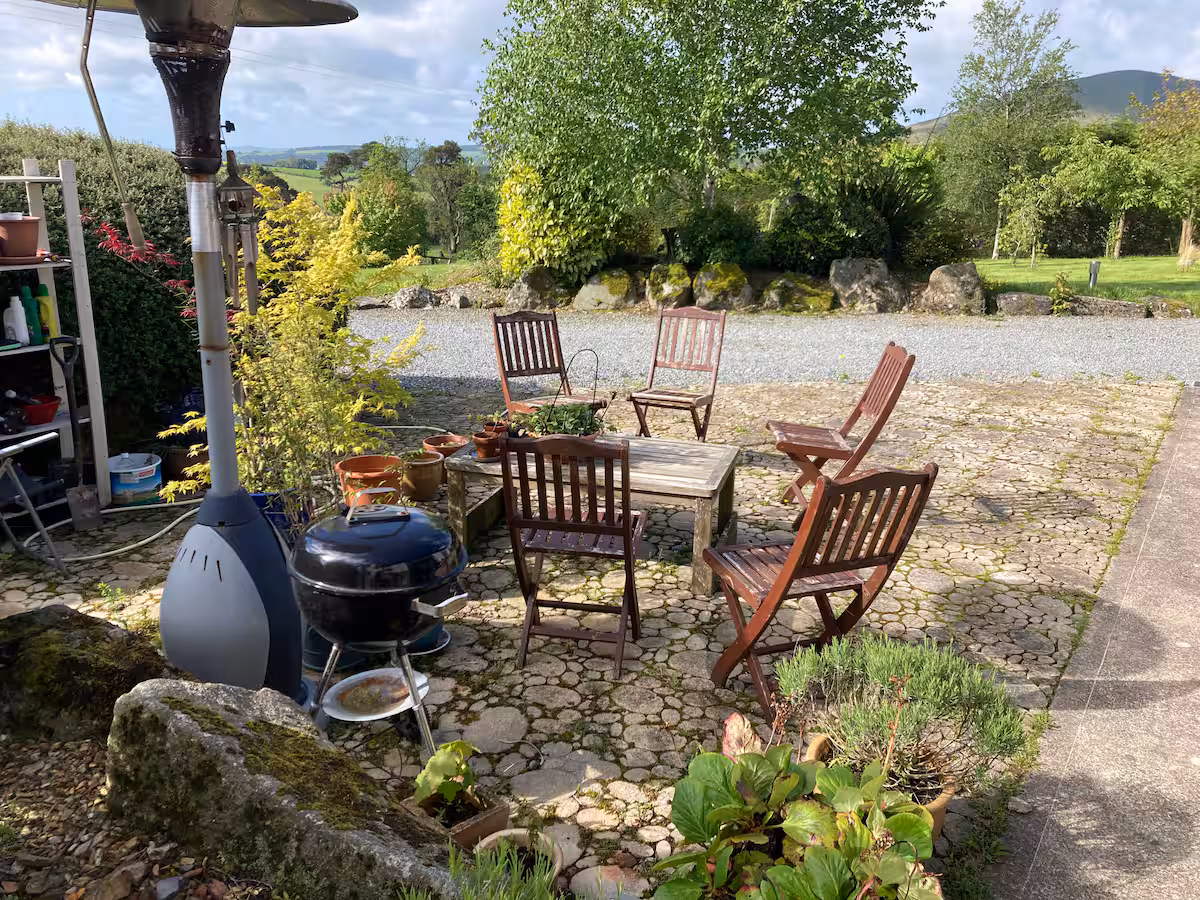 The patio, chairs, and a slow evening